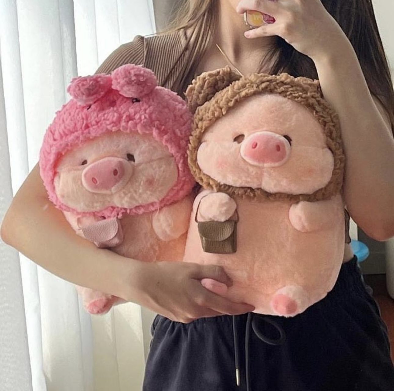 Heo nón đeo túi